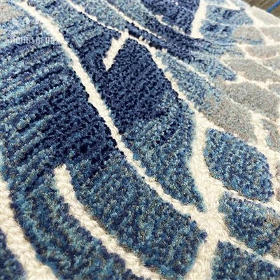 Tapis à boucles basses et coupe haute