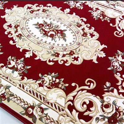 Puis-je trouver des tapis à grandes boucles aux motifs géométriques ?